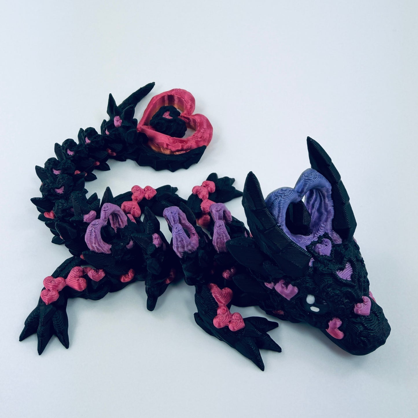 Black and Rainbow baby dark heart dragon