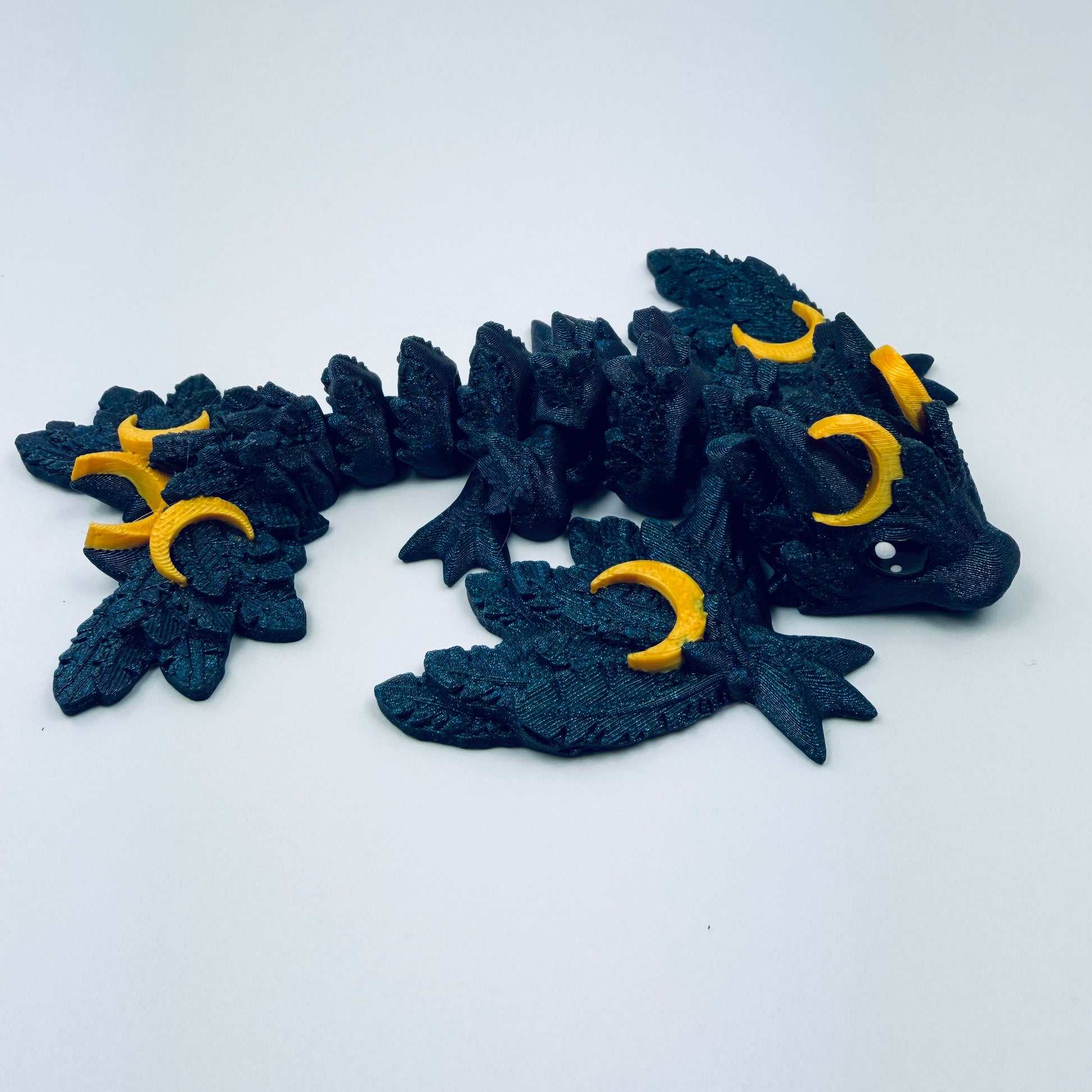 Tiny Lunar wyvern with gold hearts