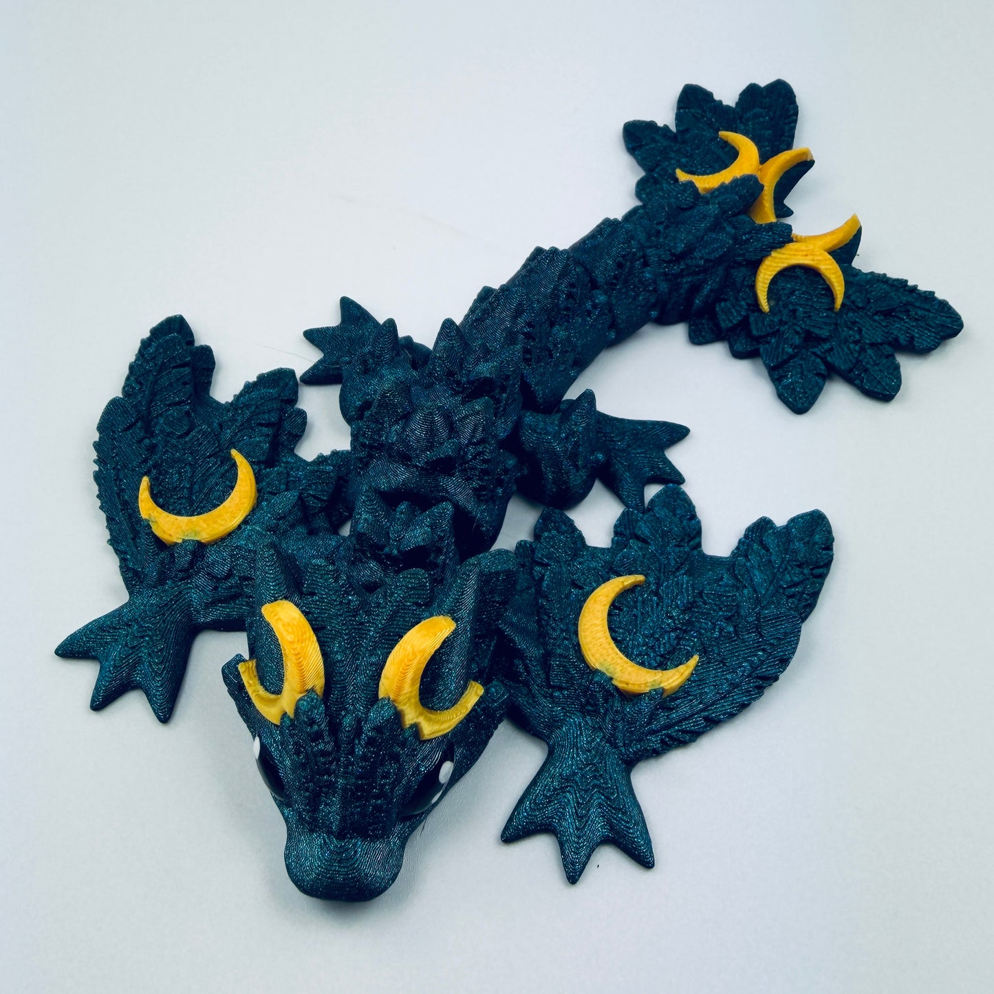 Tiny Titanium lunar wyvern with gold hearts