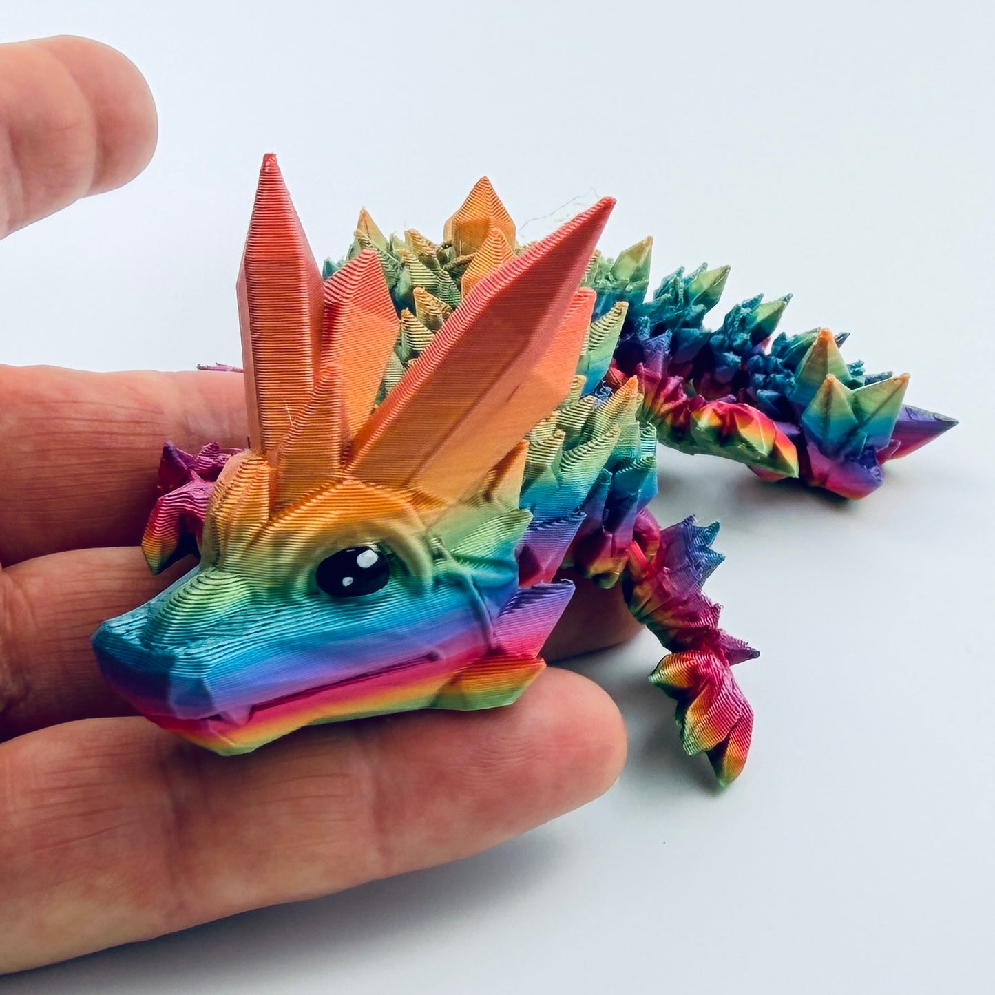 baby crystal dragon - rainbow closeup