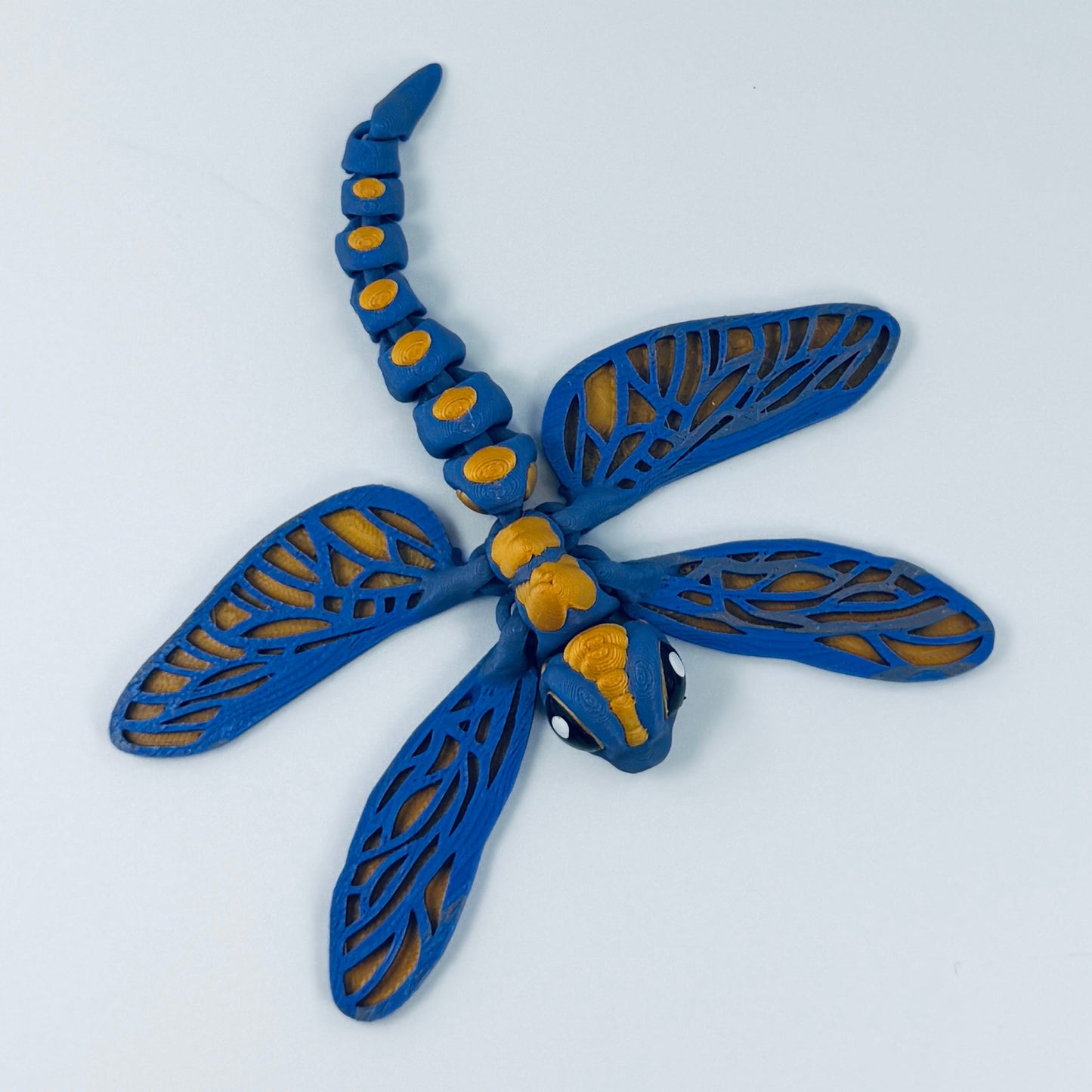3d printed purple and gold dragonfly