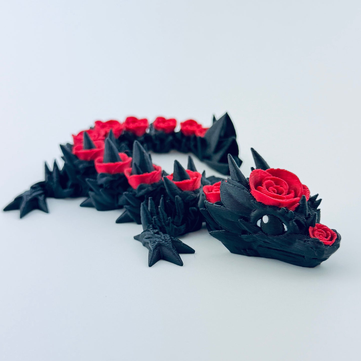 3d printed baby rose dragon - black and red - view 7
