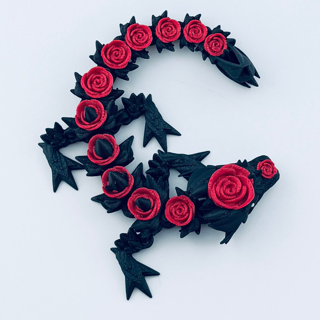 3d printed baby rose dragon - black and red - view 5