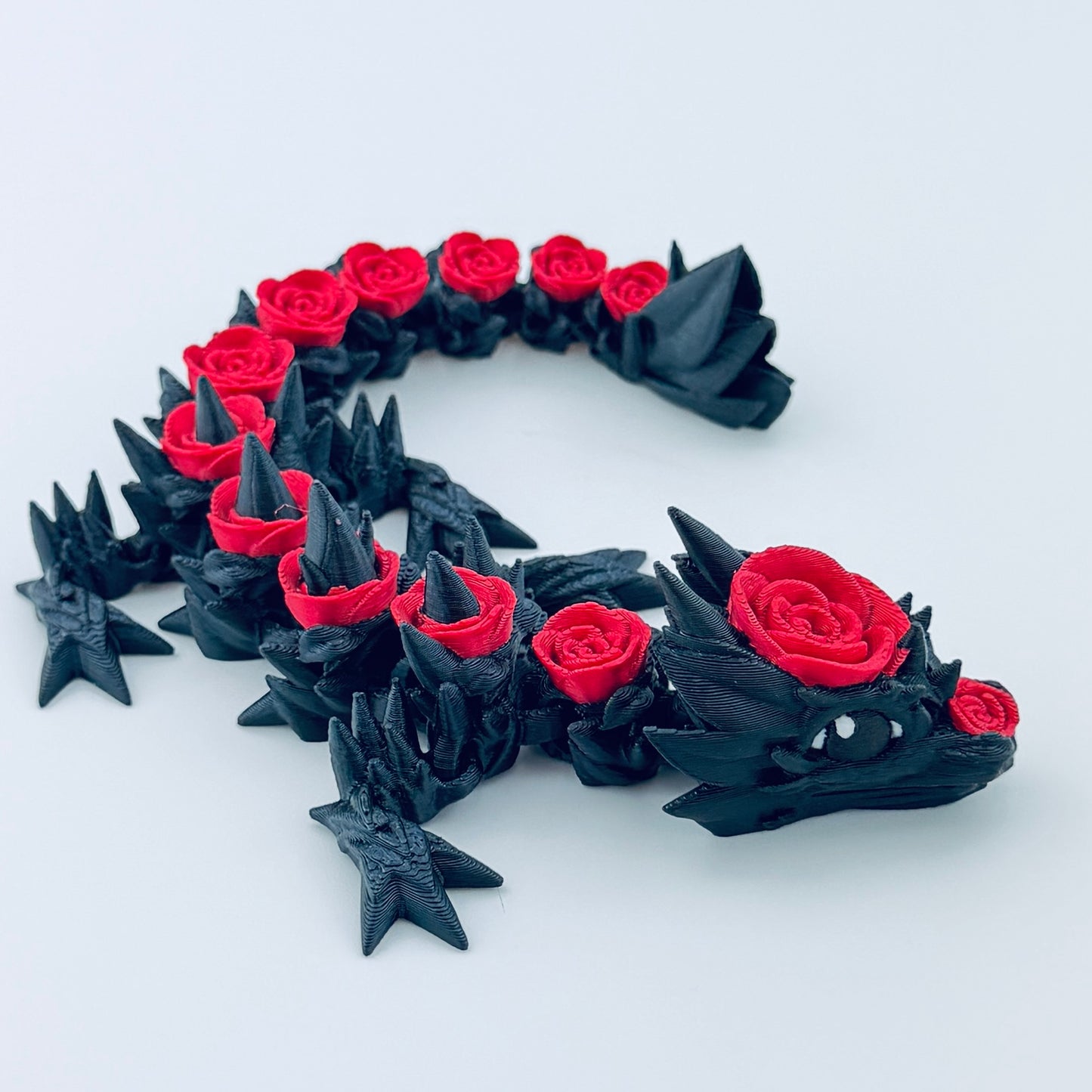 3d printed baby rose dragon - black and red - view 4