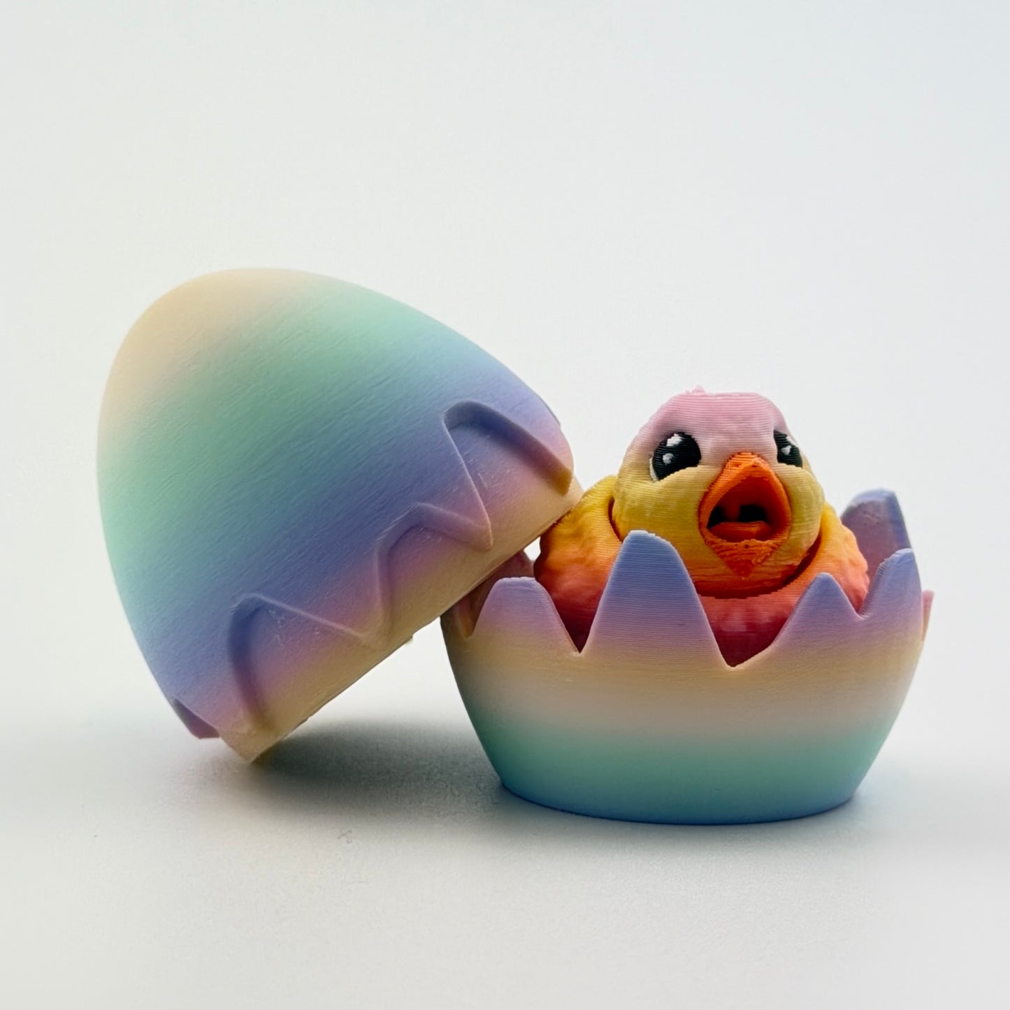 3d printed chick inside rainbow egg - view 3