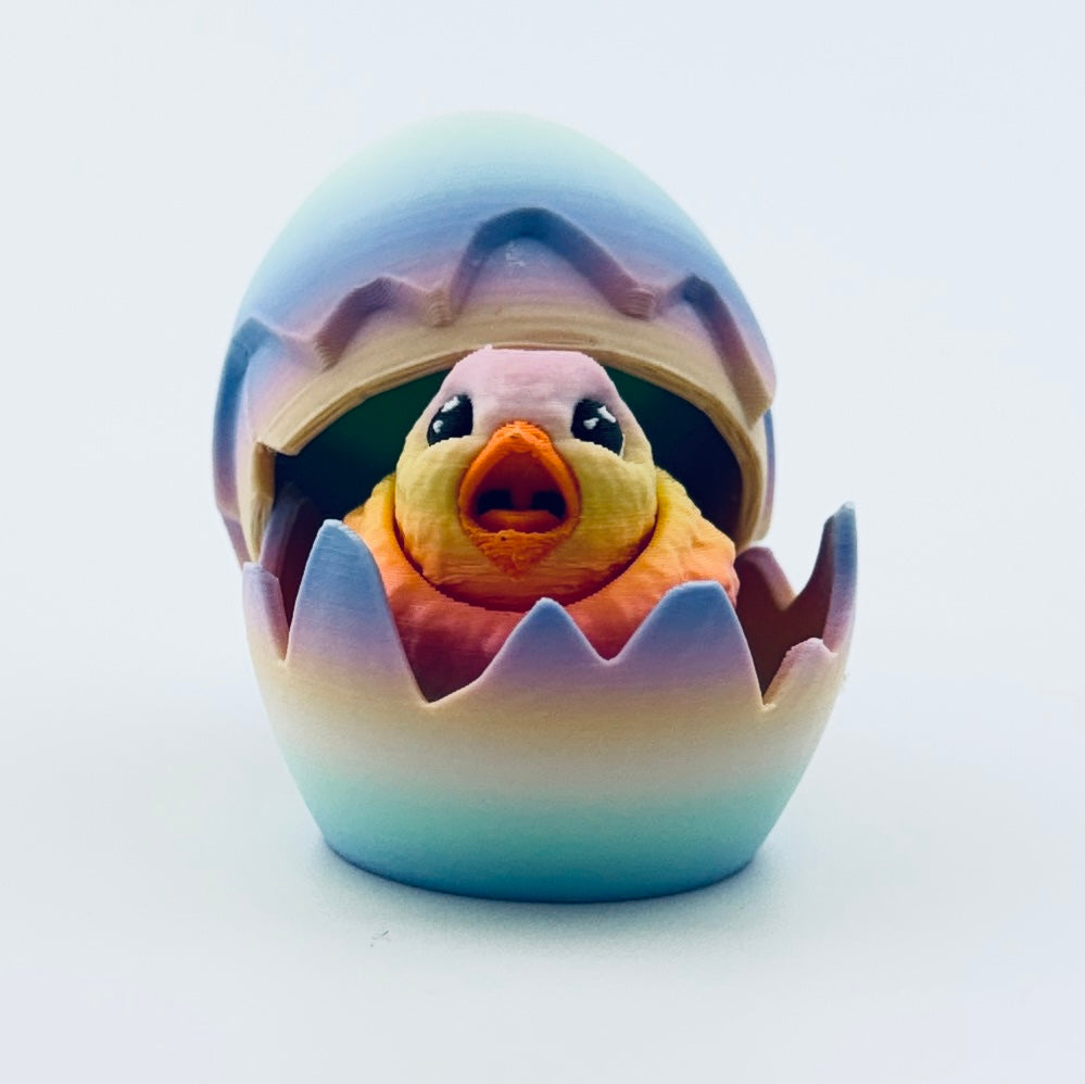3d printed chick inside rainbow egg
