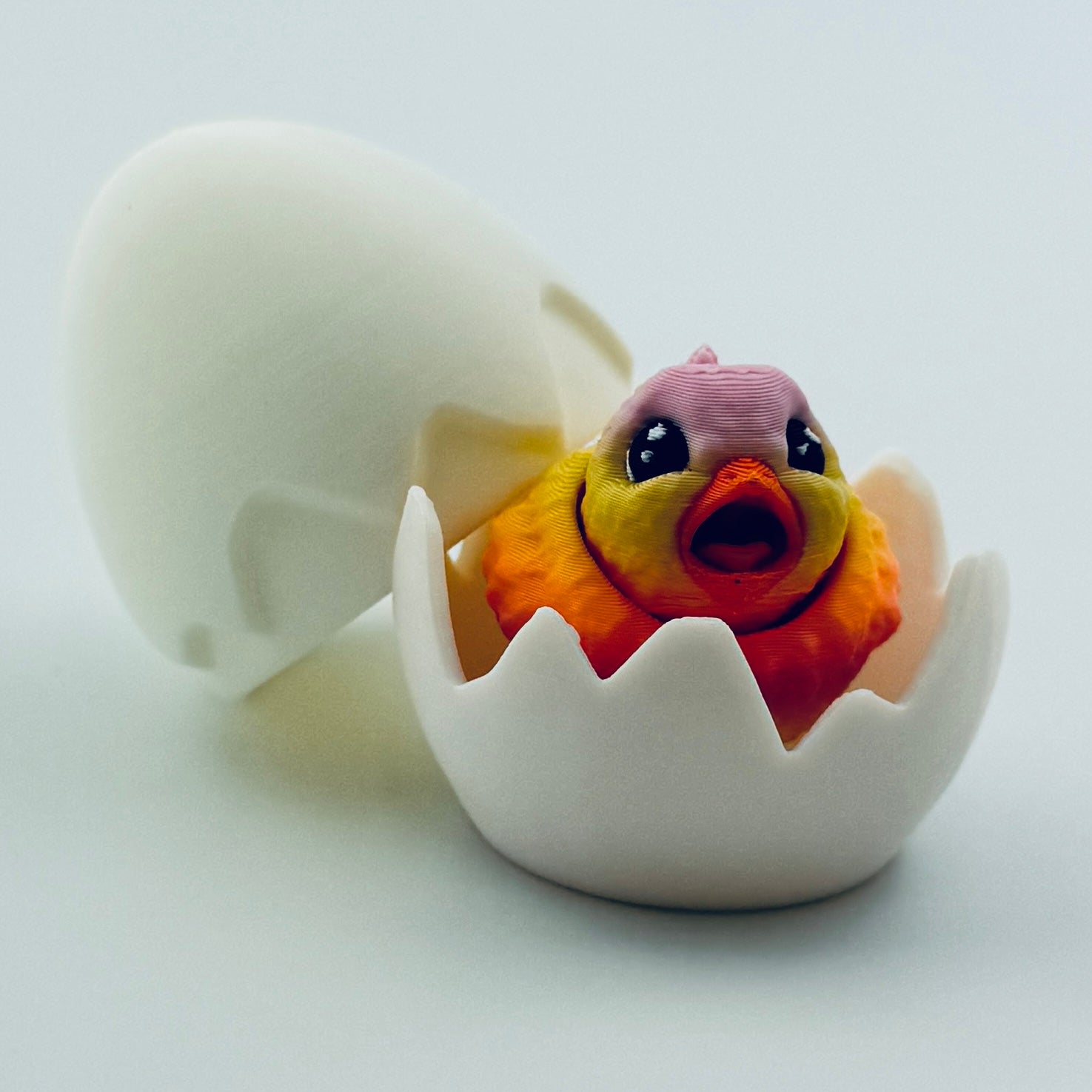 3d printed chick inside white egg - open mouth